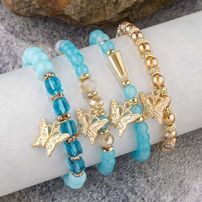 4-Piece Bohemian Butterfly Charm Bracelet Set – Crystal Beads & Stylish Layered Design