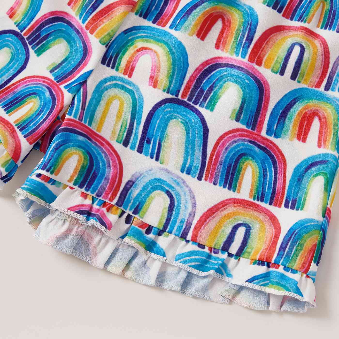 Asymmetrical Neck Top and Rainbow Print Shorts Set